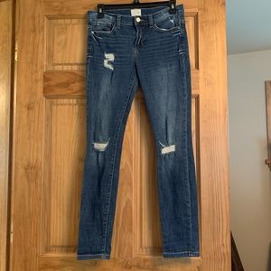 Distressed skinny jeans